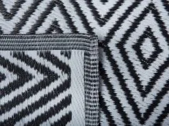 Beliani Dywan Zewnętrzny 150 X 210 Cm Czarny SIKAR -Wanny sklep undef src sa picid 715985 type whitesh image