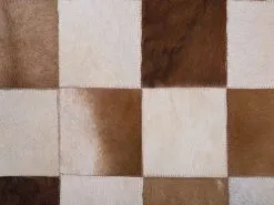 Beliani Dywan Skórzany Brązowo-beżowy SOLMAZ Różne Rozmiary -Wanny sklep undef src sa picid 758303 type whitesh image